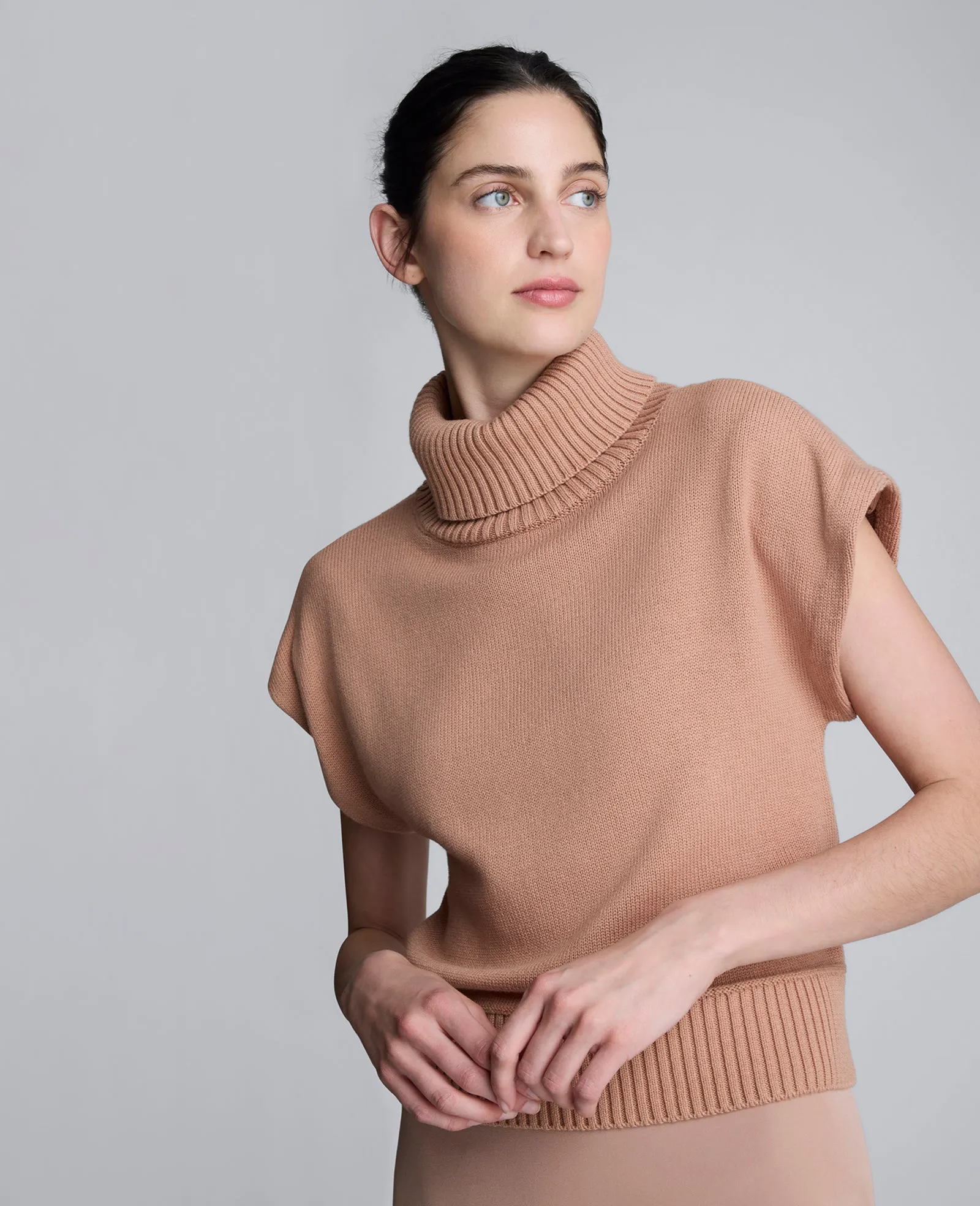 Sleeveless Mockneck Sweater with Shoulder Pads sold by Kenneth Cole