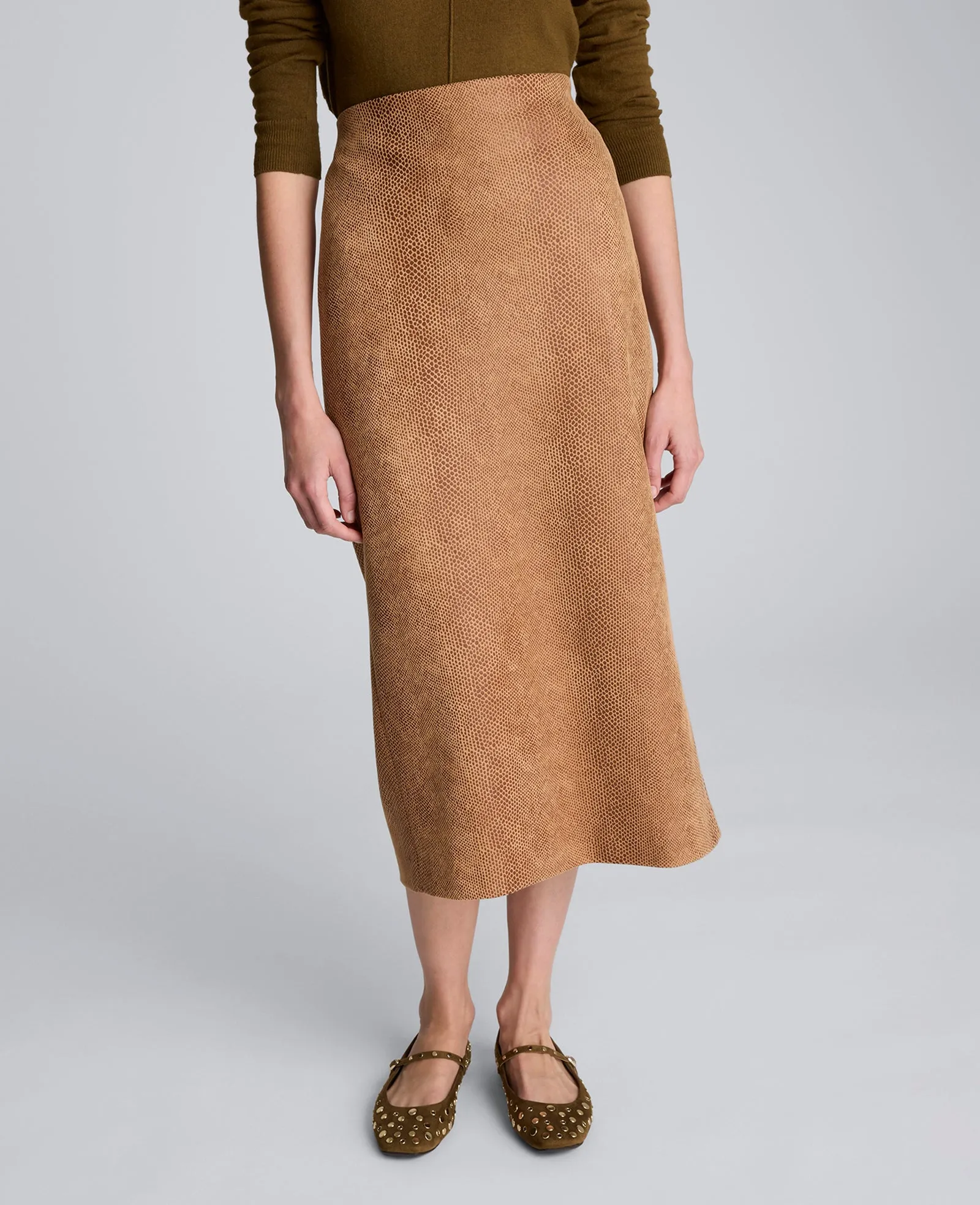 Snake Embossed Pull On Midi Skirt sold by Kenneth Cole