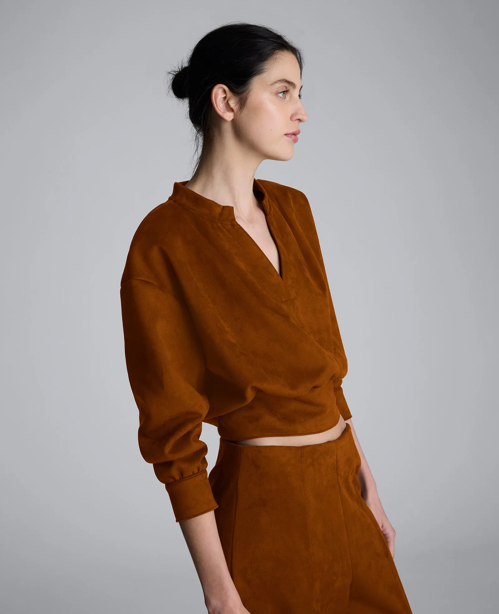 Faux Suede Shoulder Pleated Long Sleeve Knit Pullover sold by Kenneth Cole