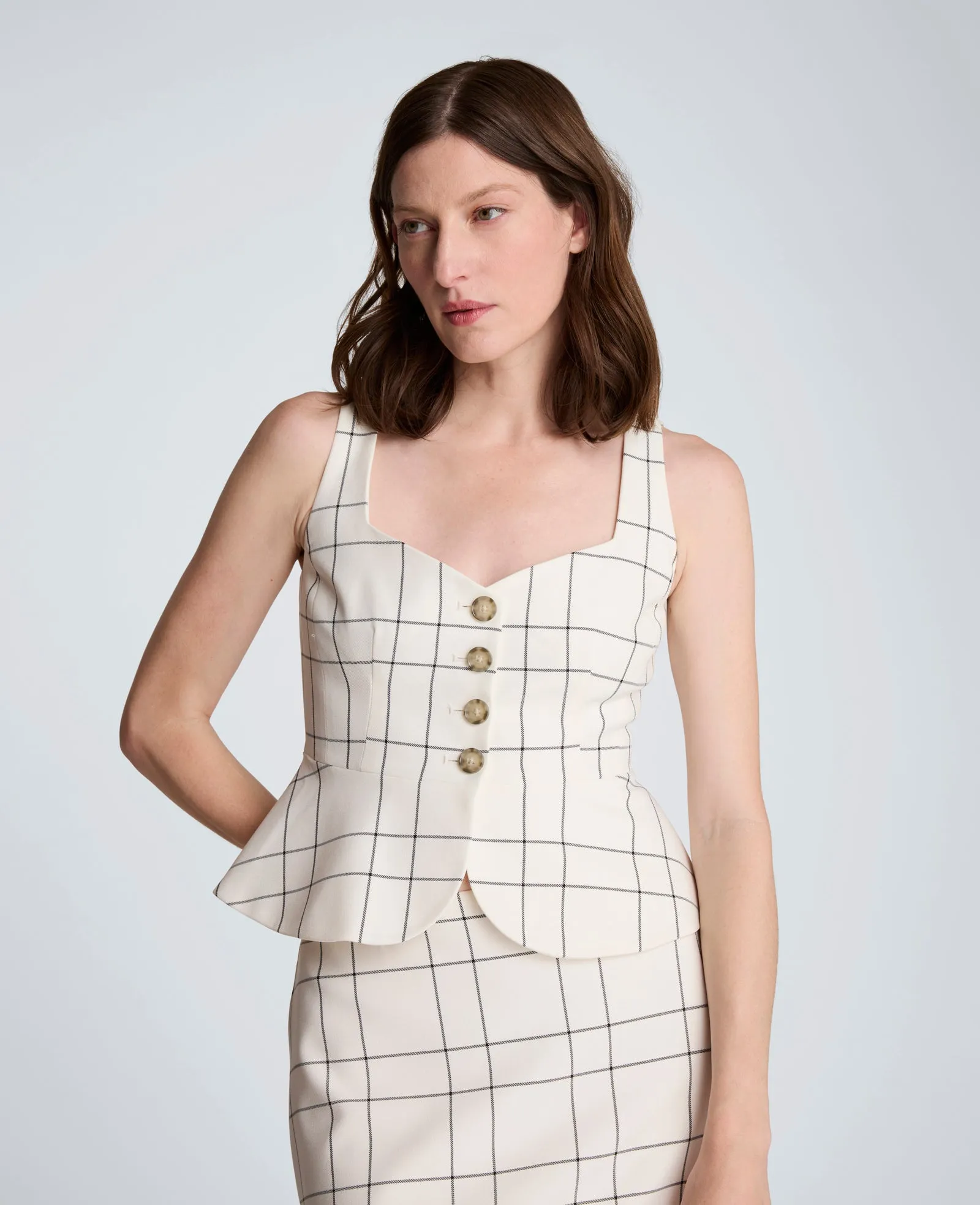 Plaid Curved Four Button Peplum Vest sold by Kenneth Cole