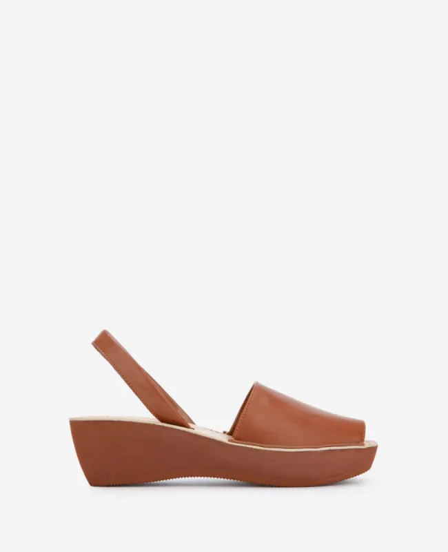 Fine Glass Platform Sandal sold by Kenneth Cole