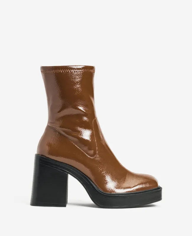 Amber Patent Block Heel Bootie sold by Kenneth Cole