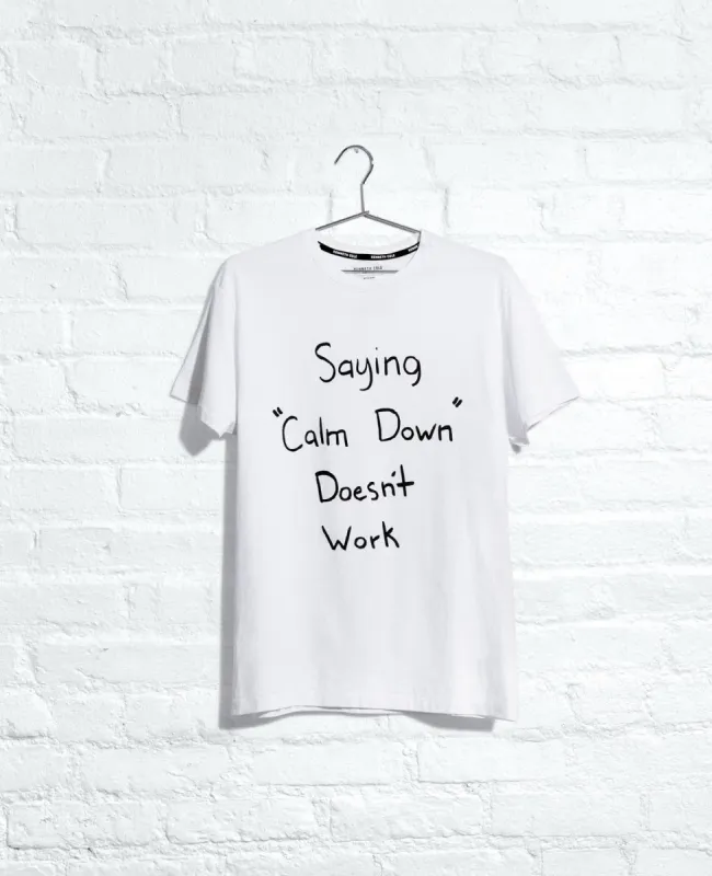Site Exclusive! Dude With Sign Saying "Calm Down" Doesn't Work T-Shirt made by Kenneth Cole