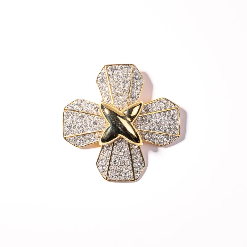 Polished Gold and Crystal Cross Pin sold by Kenneth Jay Lane