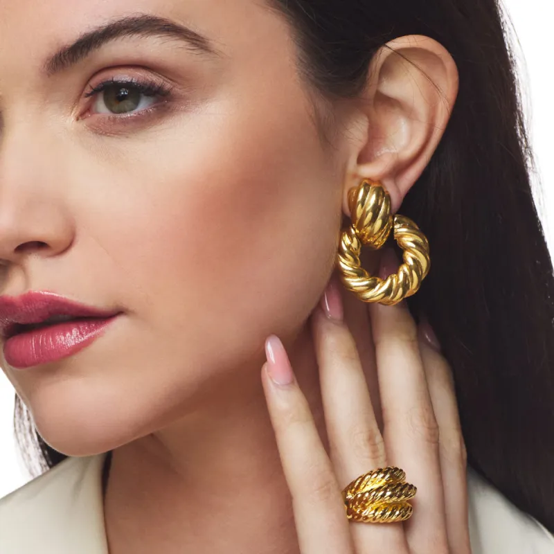 Twist Doorknocker Clip Earring sold by Kenneth Jay Lane