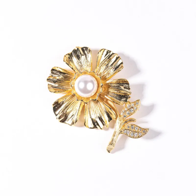 Gold with Pearl and Crystal Center Flower Pin sold by Kenneth Jay Lane