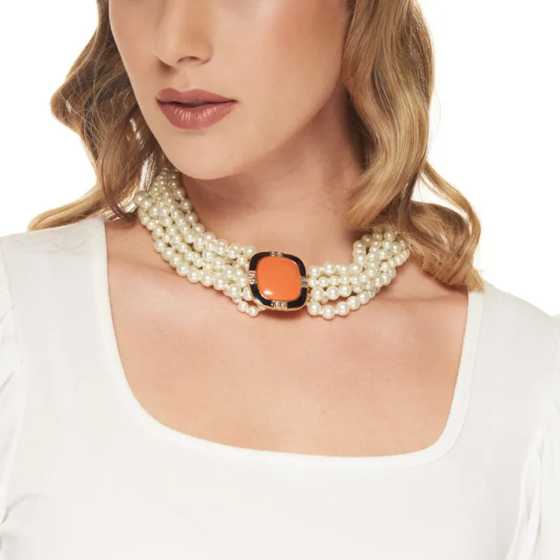 Vintage Eight Row White Pearl with Coral Center Clasp Necklace sold by Kenneth Jay Lane