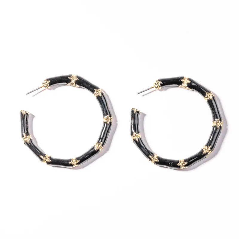 Medium Black Bamboo Hoop Pierced Earrings sold by Kenneth Jay Lane