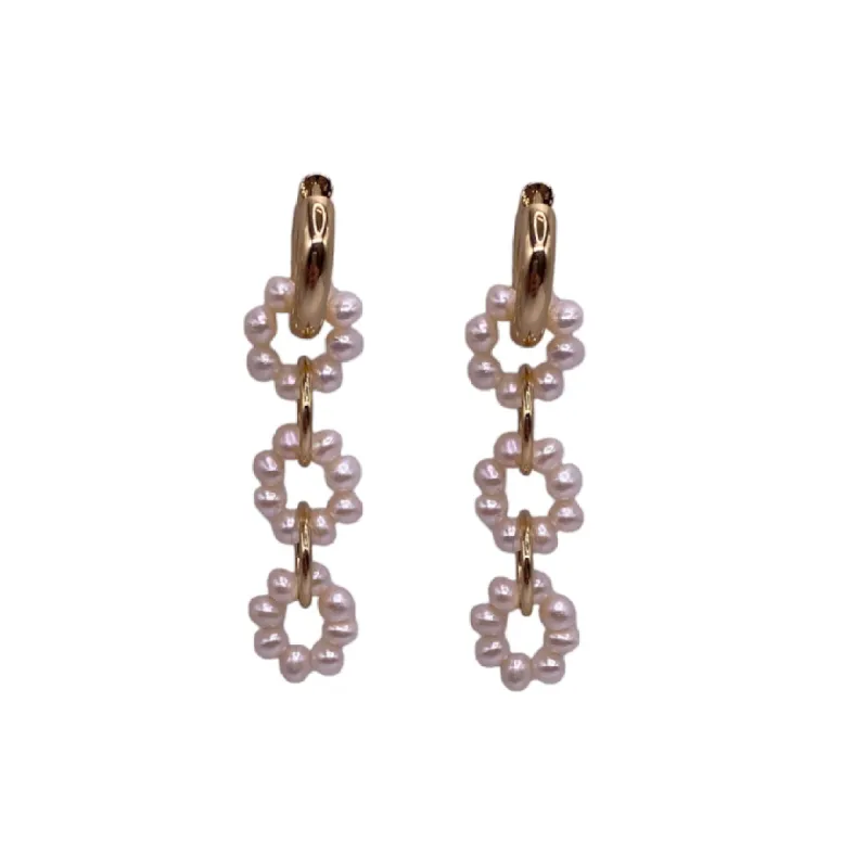 Freshwater Pearl and Polished Gold Interlocking Earrings sold by Kenneth Jay Lane
