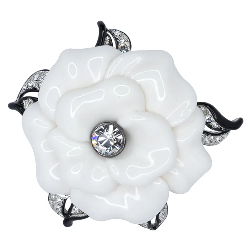 White Resin Flower Pin sold by Kenneth Jay Lane
