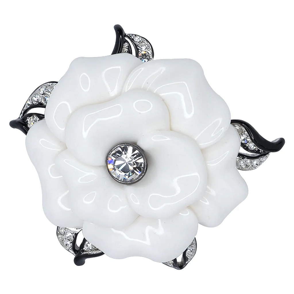 White Resin Flower Pin sold by Kenneth Jay Lane