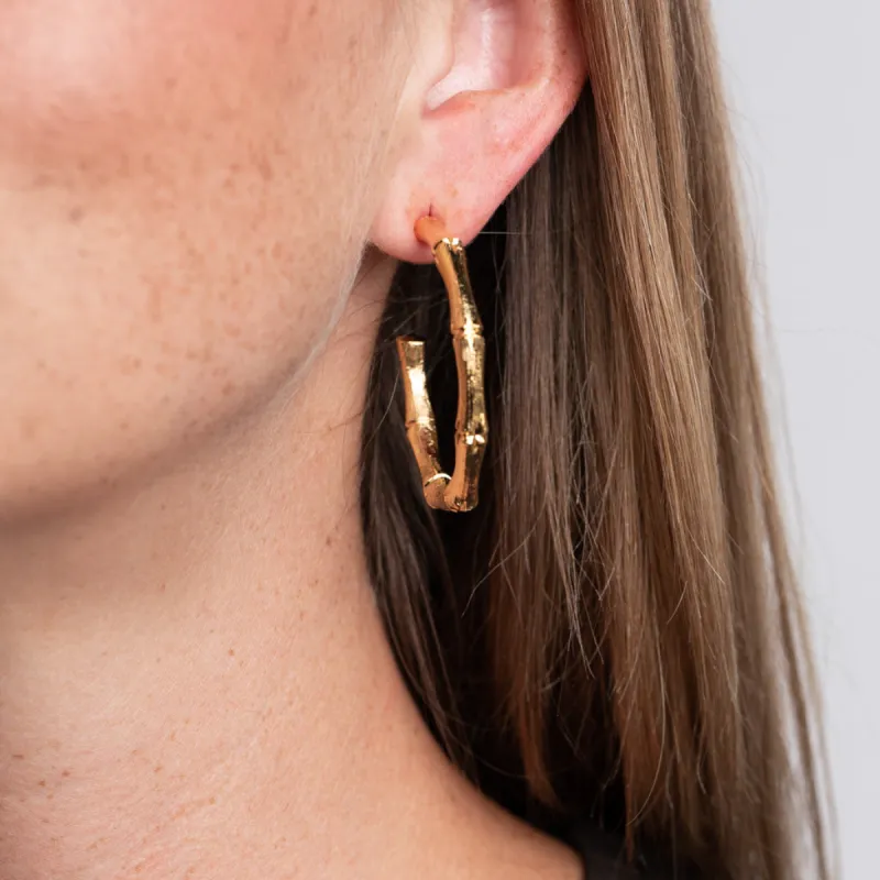 Medium Gold Bamboo Hoop Clip-On Earrings sold by Kenneth Jay Lane