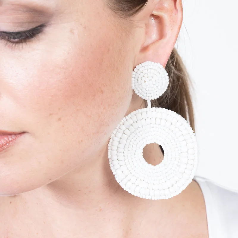 White Seedbead Circle Drop Pierced Earrings sold by Kenneth Jay Lane