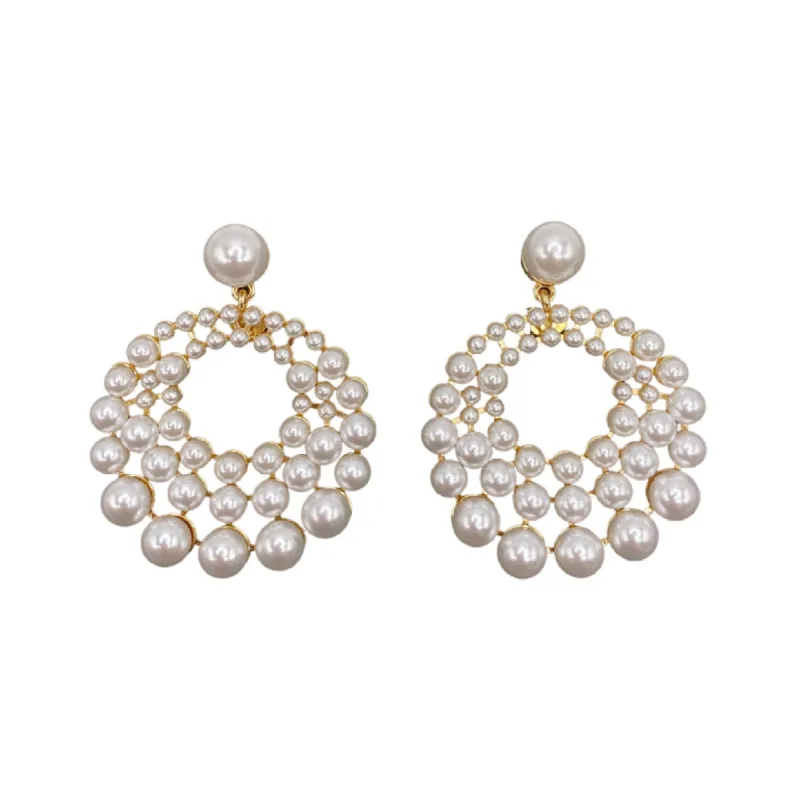Gold and White Pearl Cluster Circle Earrings sold by Kenneth Jay Lane