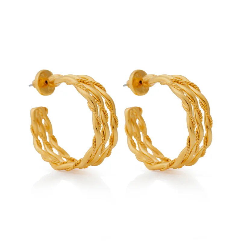 Twist Pierced Hoop Earrings sold by Kenneth Jay Lane