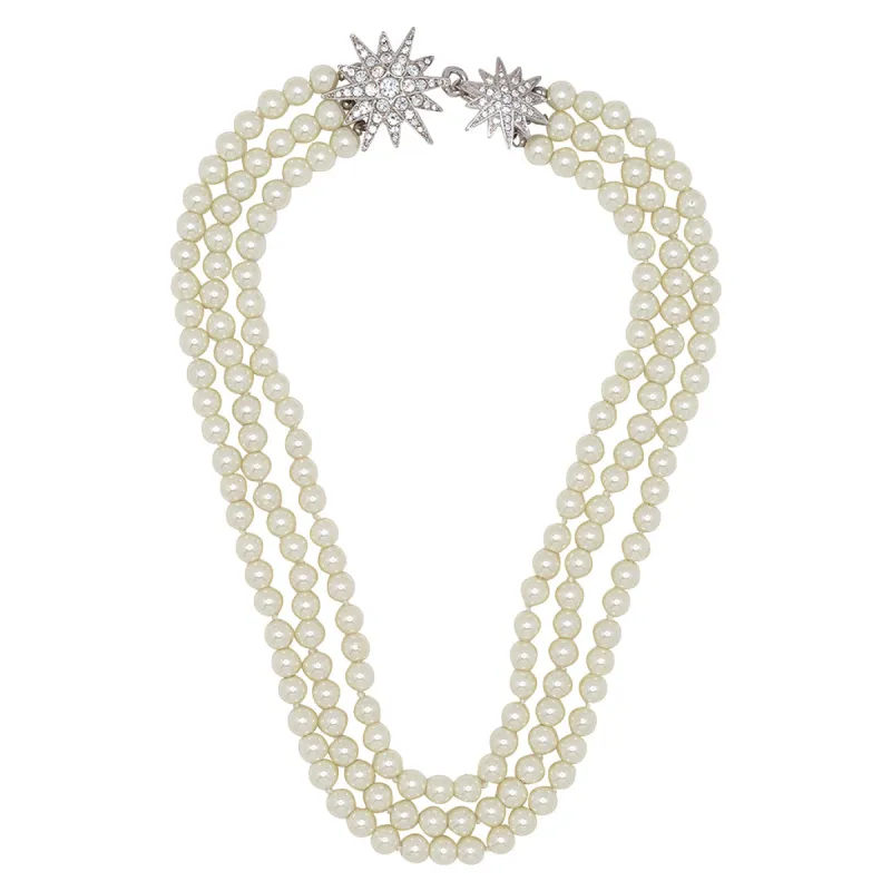 Three Row Pearl Necklace with Starburst Clasp sold by Kenneth Jay Lane