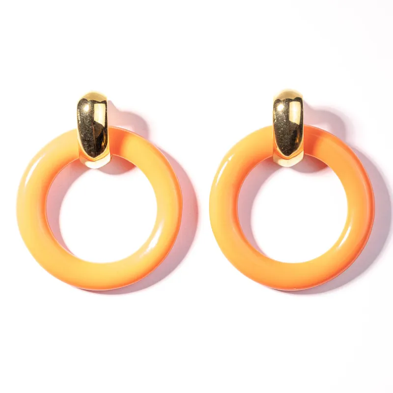 Gold and Coral Ring Doorknocker Clip Earring sold by Kenneth Jay Lane
