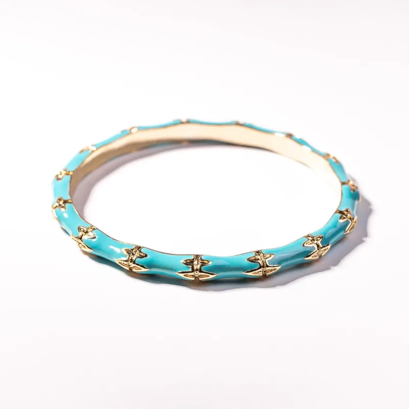 Turquoise Bamboo Bangle sold by Kenneth Jay Lane