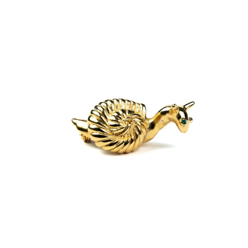 Gold Snail Pin with Emerald Eyes sold by Kenneth Jay Lane
