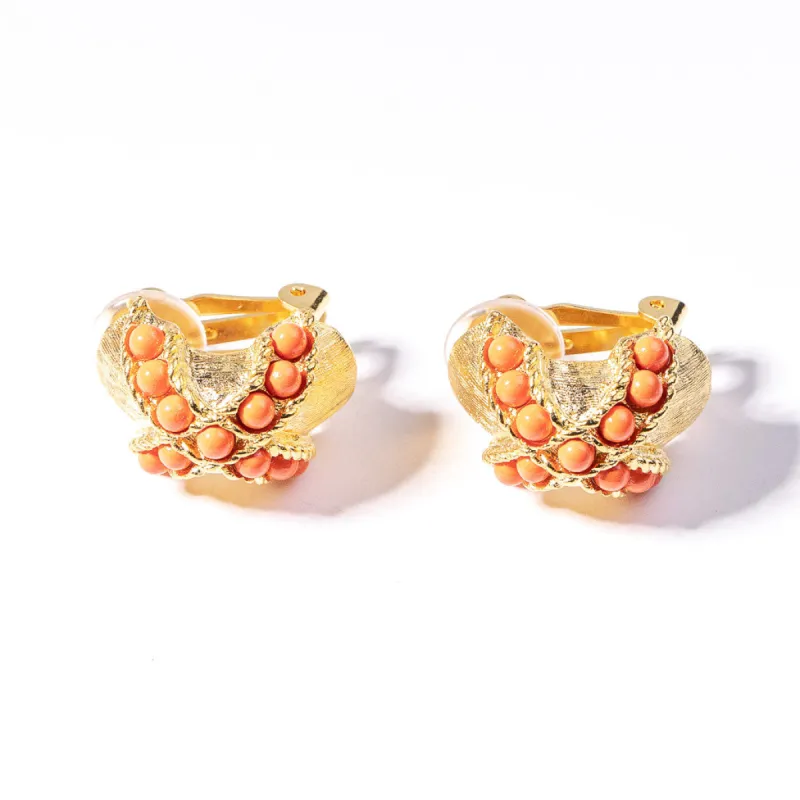 Gold Half Hoop Clip Earring with Coral "X" sold by Kenneth Jay Lane