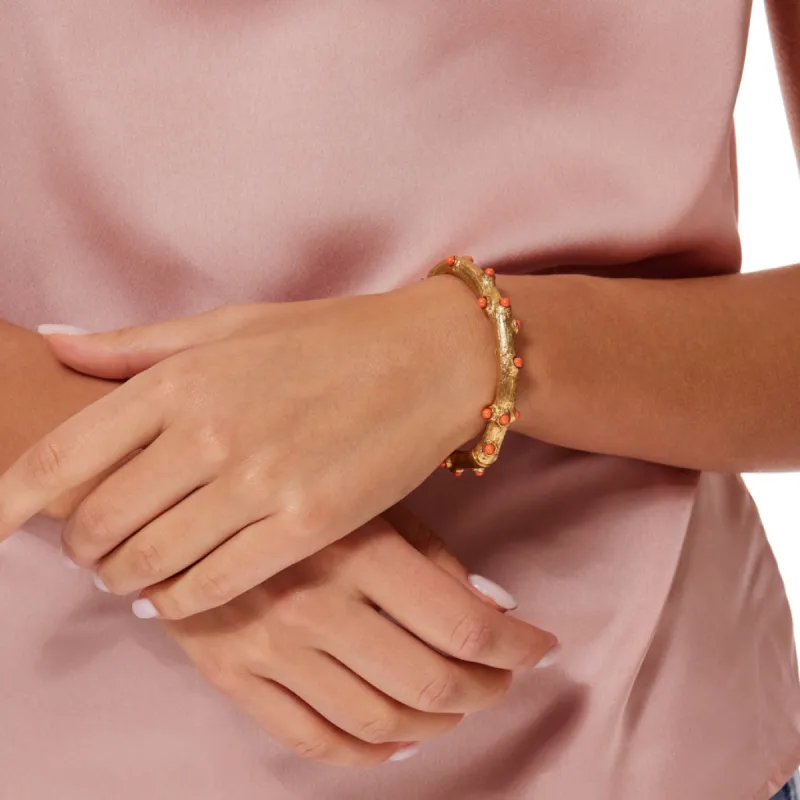 Gold Hinged Coral Shape Bracelet with Coral Dots sold by Kenneth Jay Lane