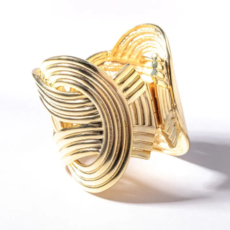 Gold Swirl Hinge Cuff sold by Kenneth Jay Lane