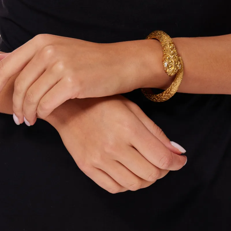 Light Antique Gold Snake Spring Bracelet with Crystal Eyes sold by Kenneth Jay Lane