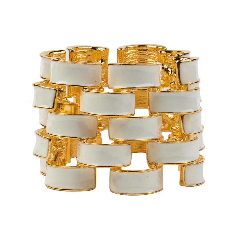 Gold and White Enamel Bracelet sold by Kenneth Jay Lane