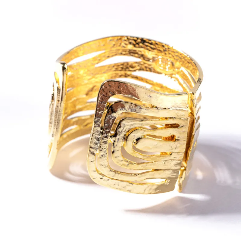Gold Wavy Cutout Cuff sold by Kenneth Jay Lane