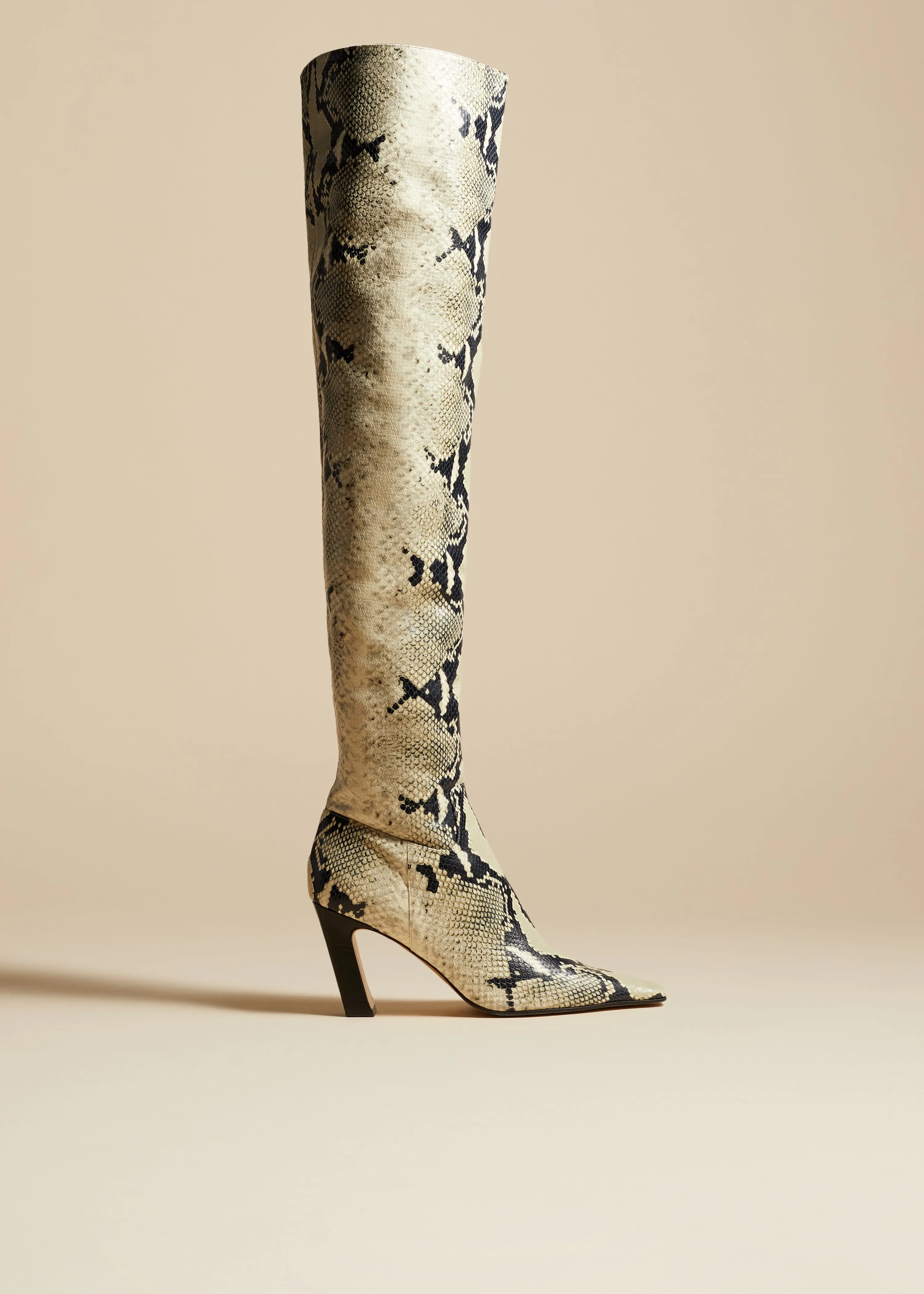 The Marfa Over-the-Knee High Boot in Natural Python-Embossed Leather sold by KHAITE