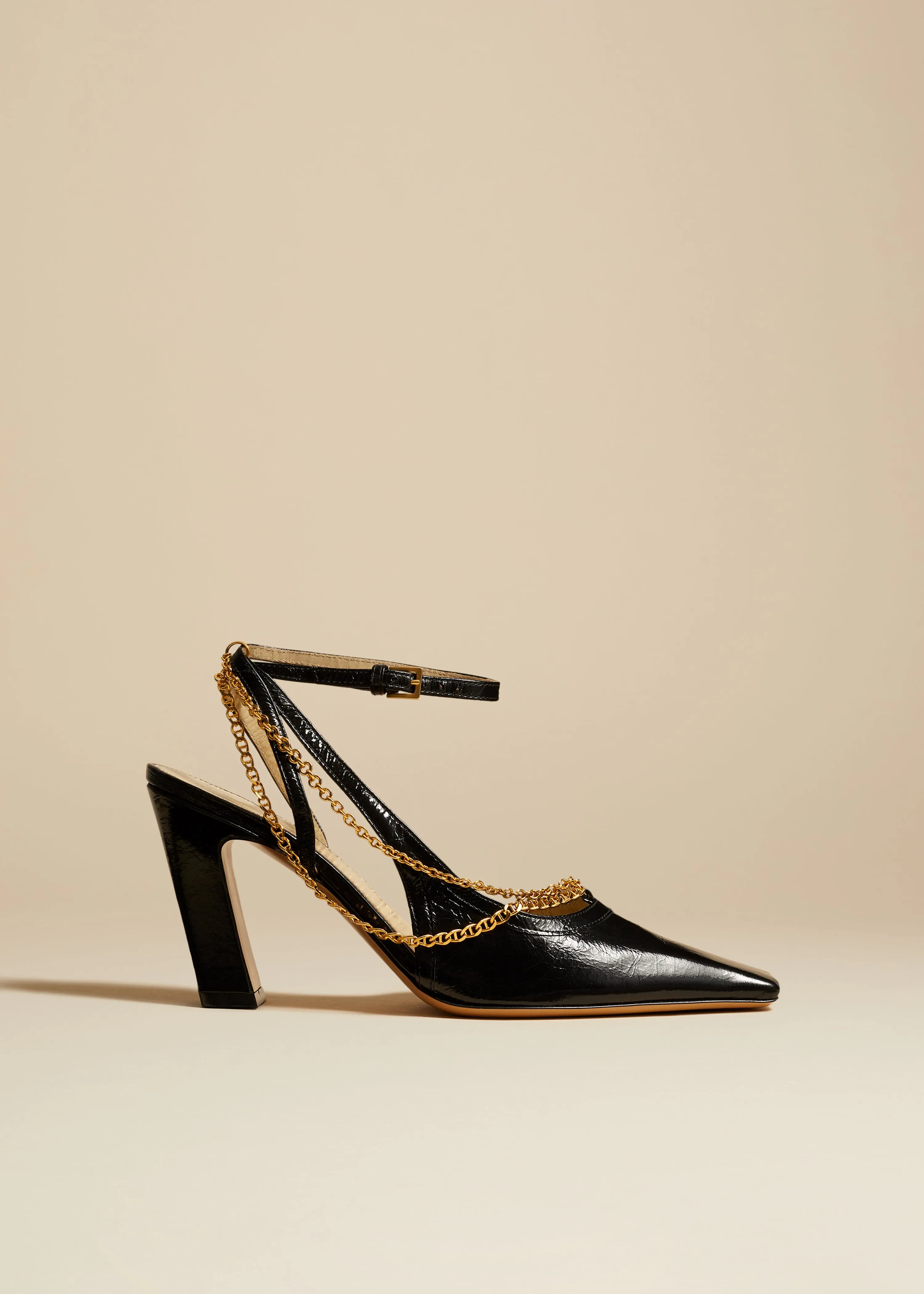 The Marfa Slingback Pump in Black Crinkled Leather sold by KHAITE