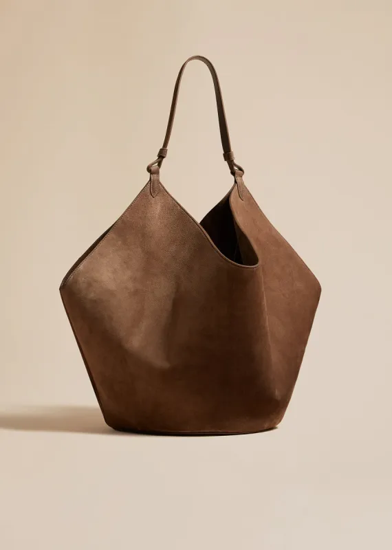 The Medium Lotus Tote in Toffee Suede sold by KHAITE