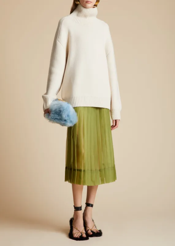 The Landen Sweater in Magnolia sold by KHAITE