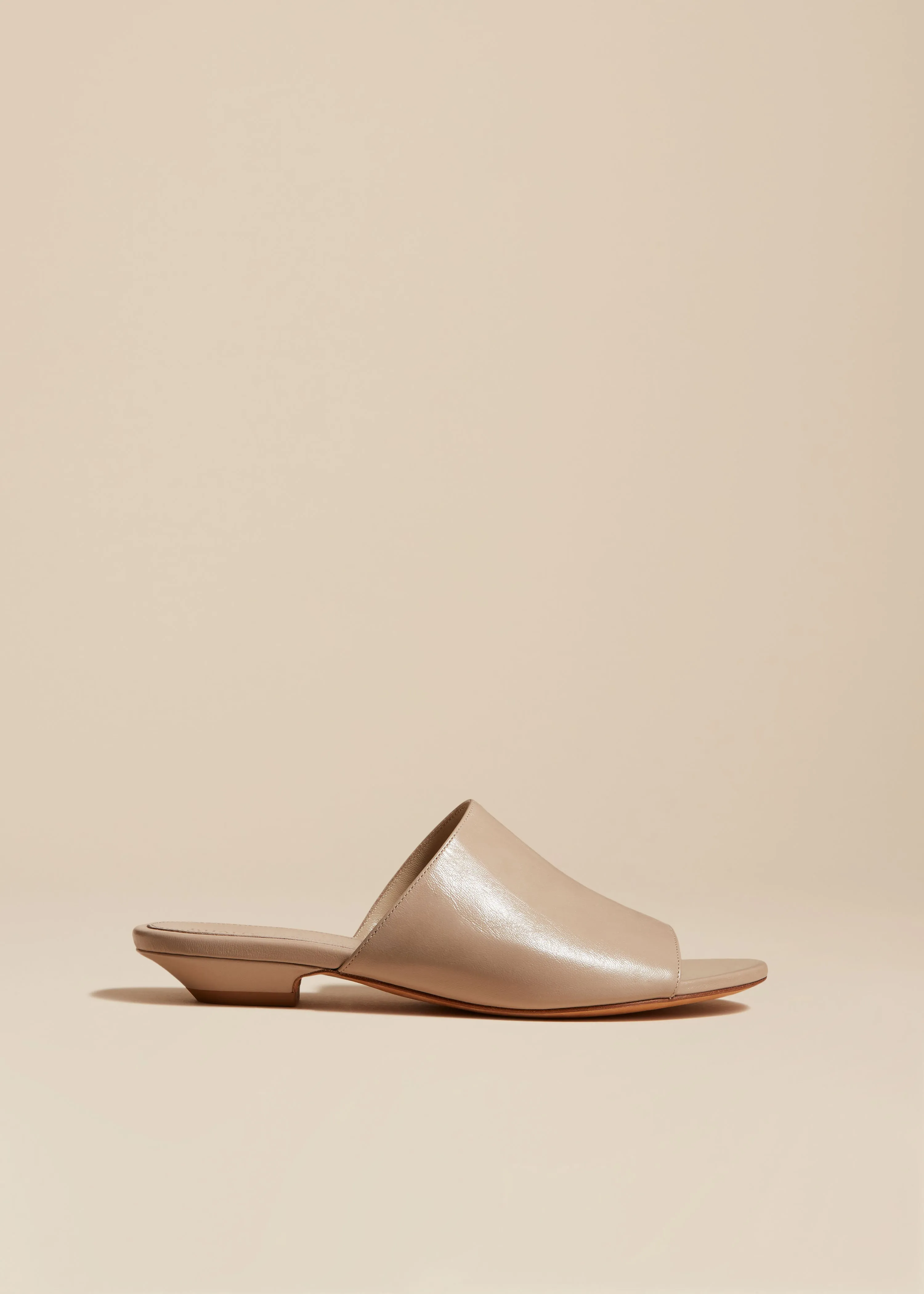 Marion Slide in Beige Leather sold by KHAITE