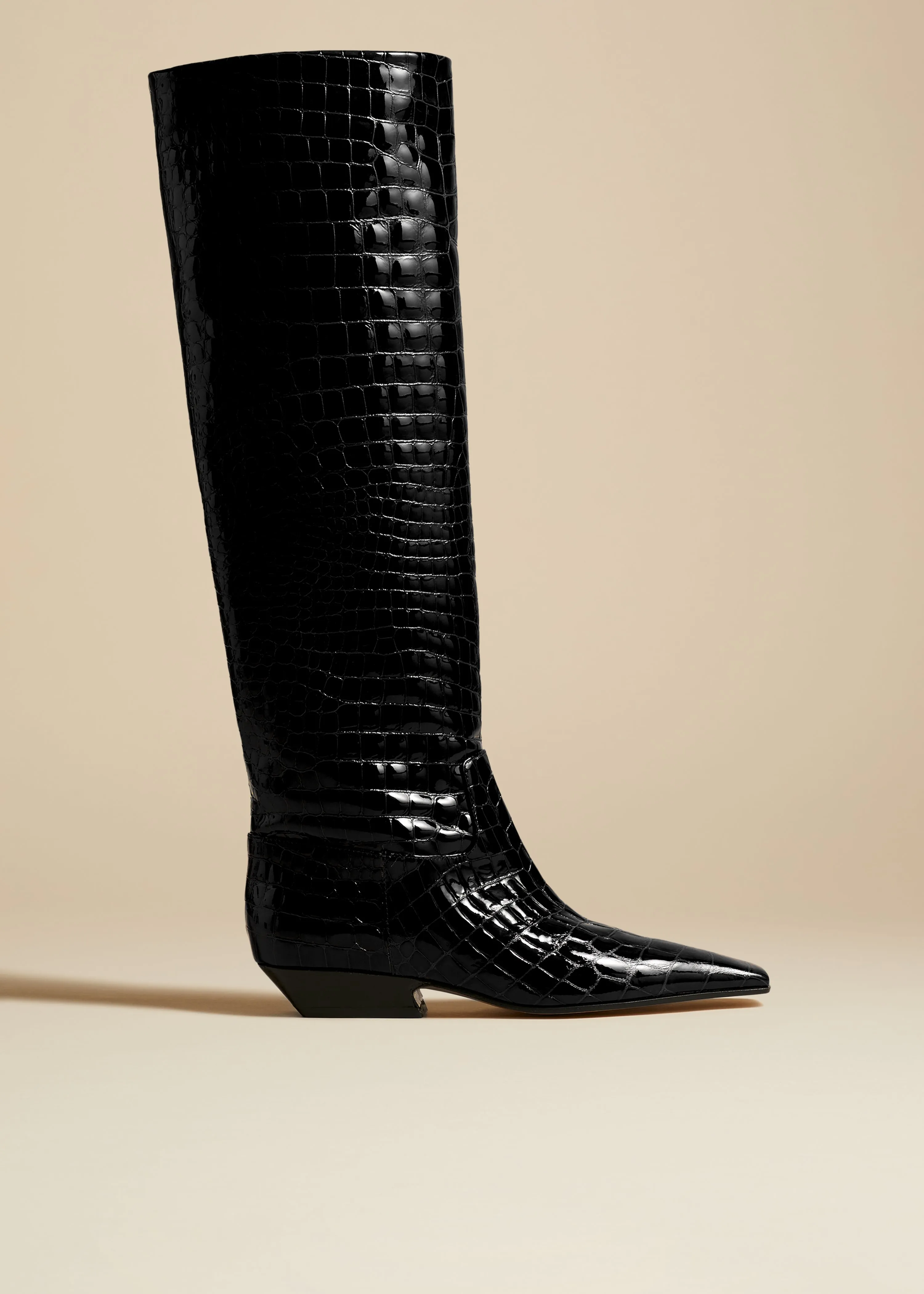 The Marfa Knee-High Boot in Black Croc-Embossed Leather sold by KHAITE