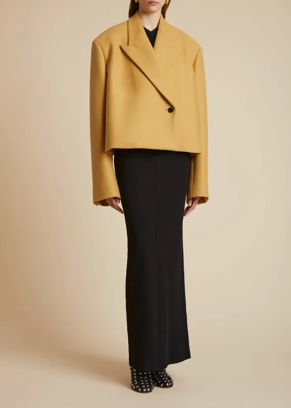 The Raymond Jacket in Camel sold by KHAITE