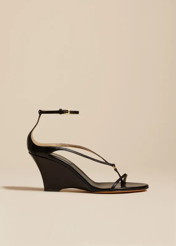 Marion Strappy Wedge Sandal in Black Leather sold by KHAITE