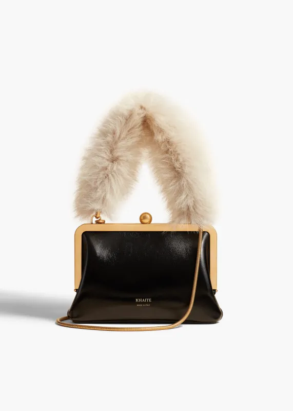 Small Lilith Evening Bag in Black Crackle Patent Leather with Shearling sold by KHAITE