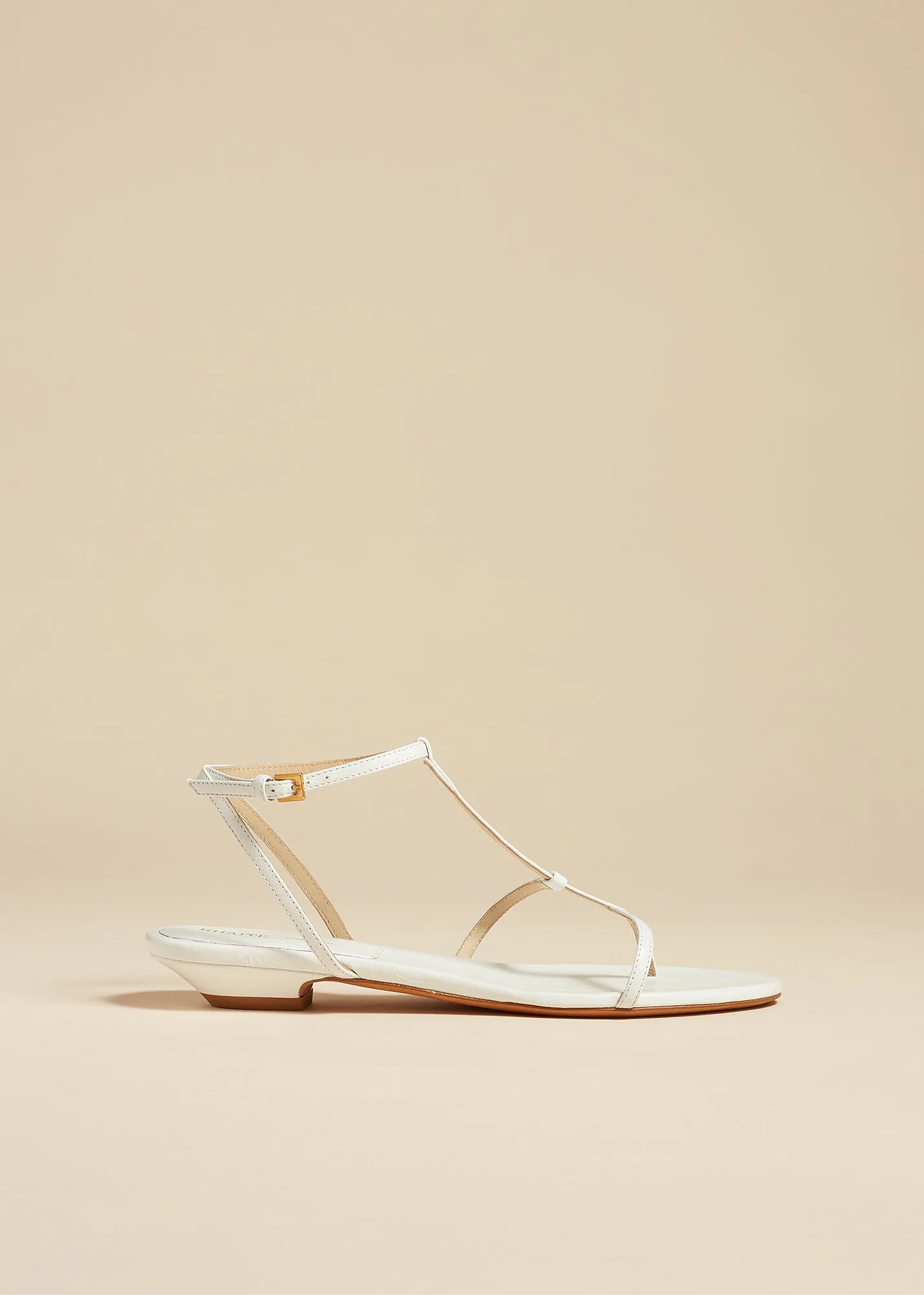 Jones Flat Sandal in White Crinkled Leather sold by KHAITE
