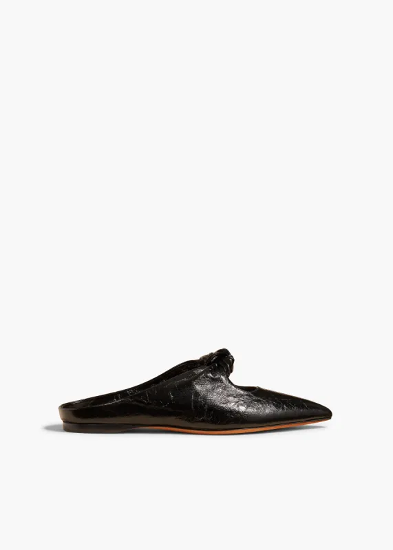 Rowan Flat Mule in Black Crinkled Leather sold by KHAITE