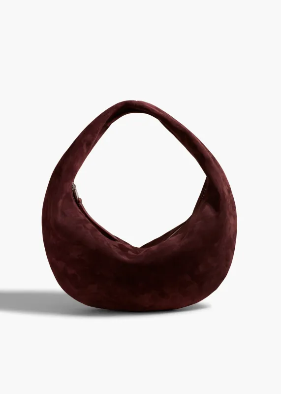 Medium Olivia Hobo in Rouge Noir Suede sold by KHAITE
