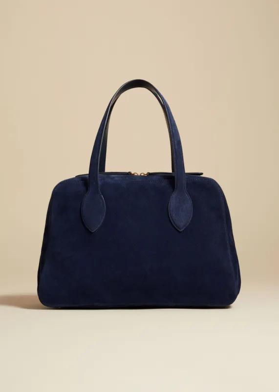 The Medium Maeve Bag in Midnight Suede sold by KHAITE