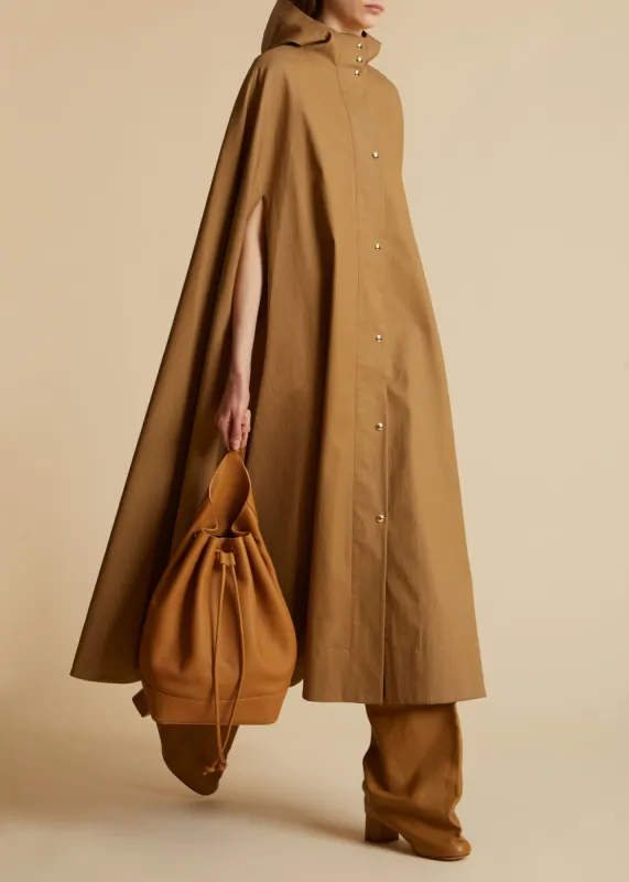 The Roygen Cape in Khaki sold by KHAITE