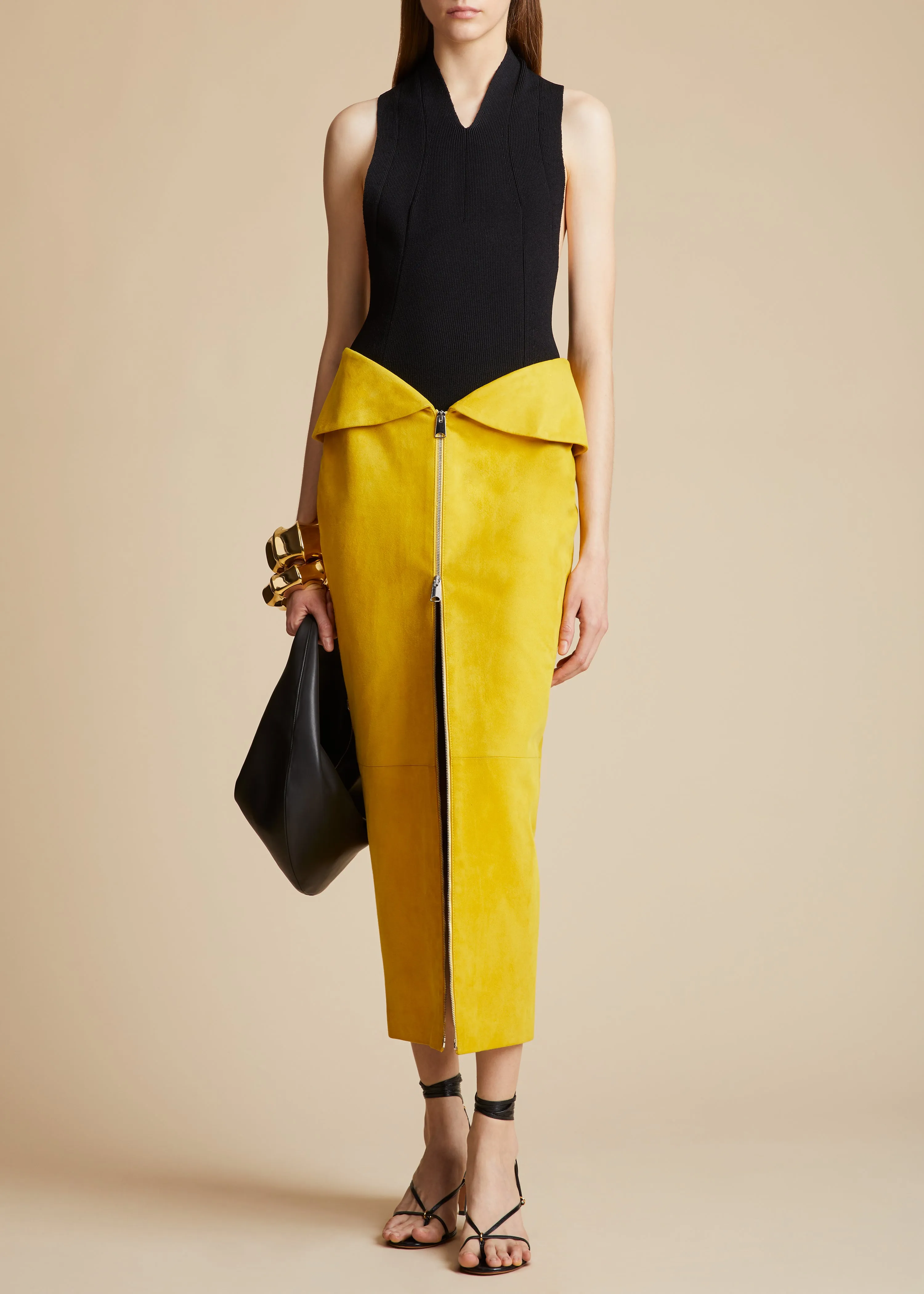The Pepita Skirt in Lemon Suede sold by KHAITE