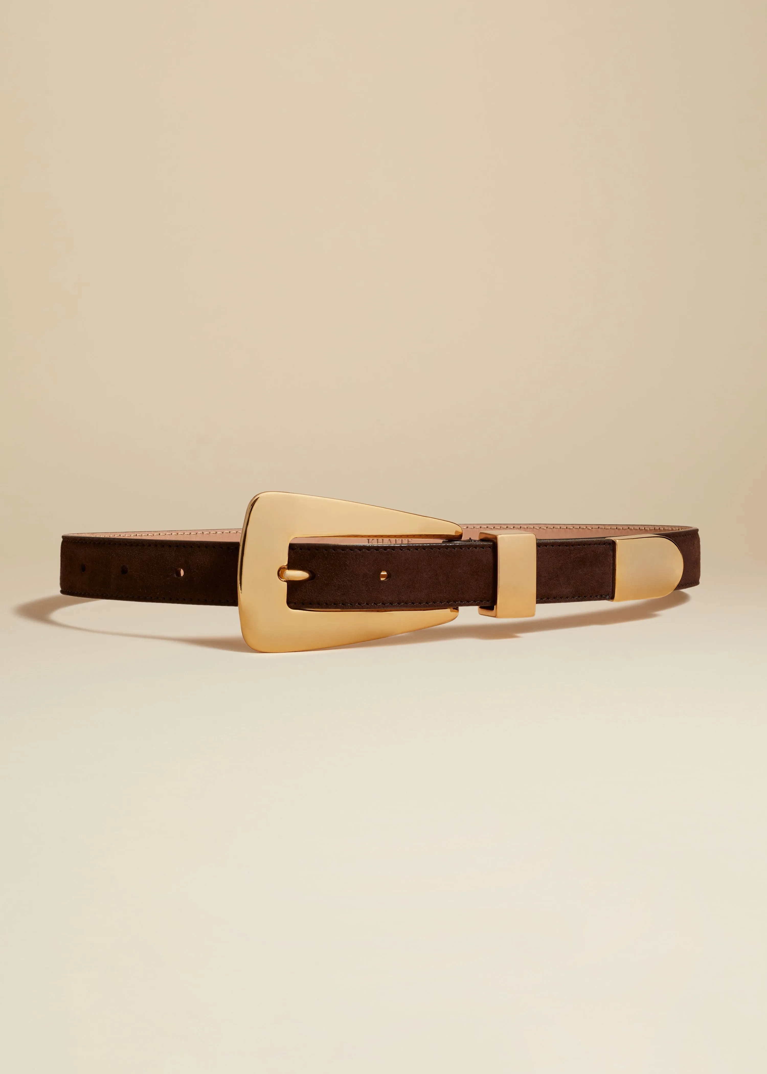 Lucca Belt in Coffee Suede with Gold sold by KHAITE