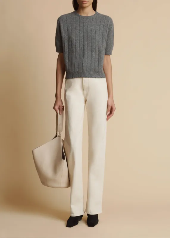 The Danielle Stretch Jean in Ivory sold by KHAITE