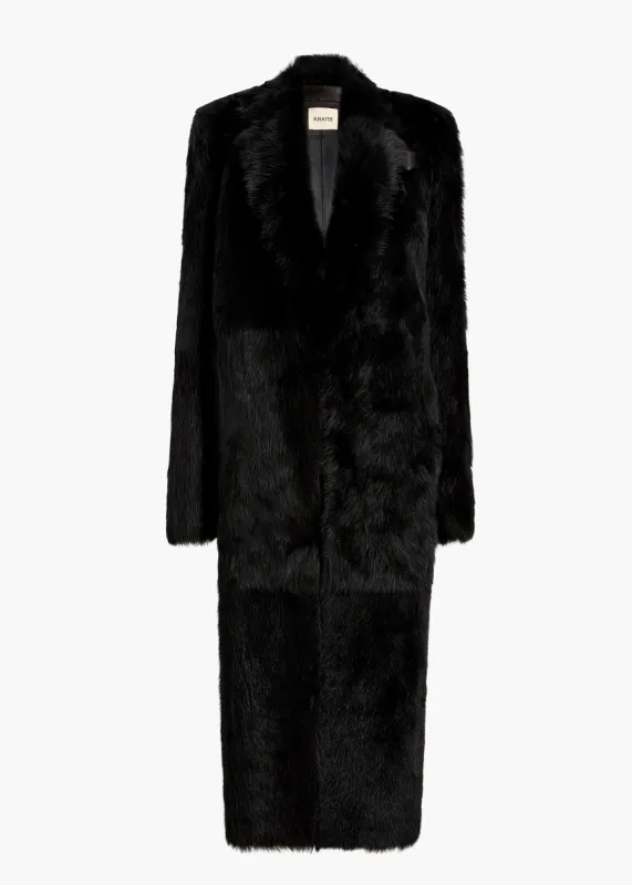 Lolo Coat in Black Shearling sold by KHAITE