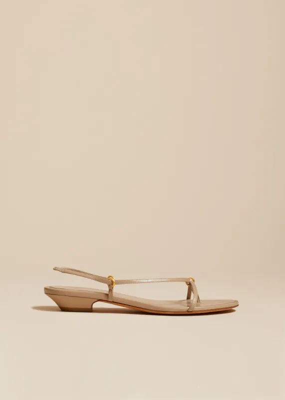 Marion Strappy Flat Sandal in Beige Leather sold by KHAITE