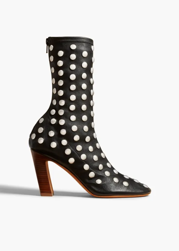 Apollo Heel Boot in Black Leather with Studs sold by KHAITE
