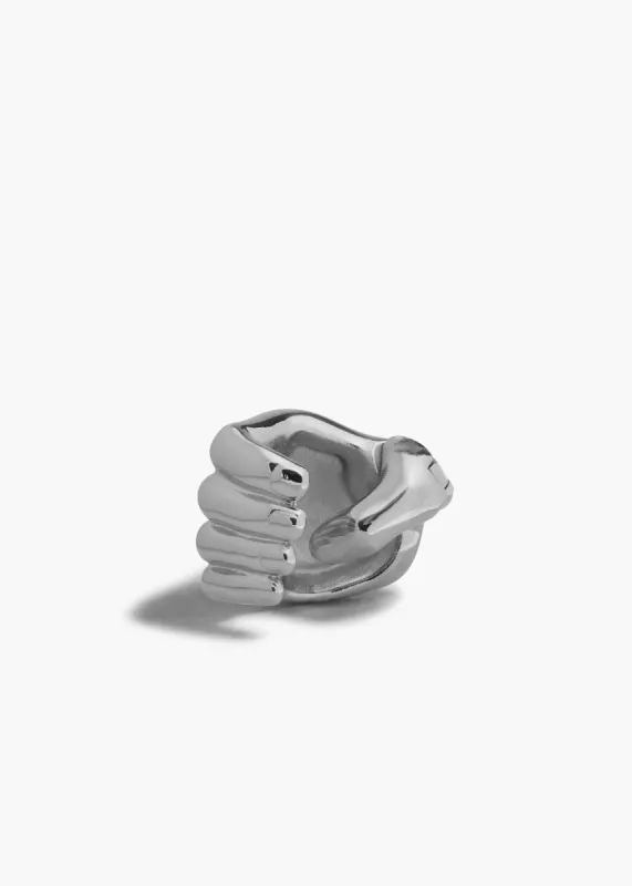 Sculpted Hand Ear Cuff in Silver sold by KHAITE
